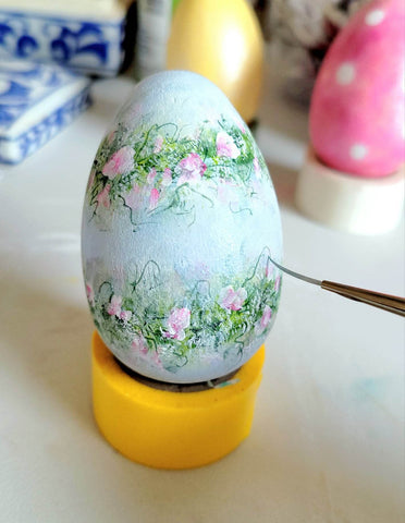 Painting Vines on a blue flowered egg