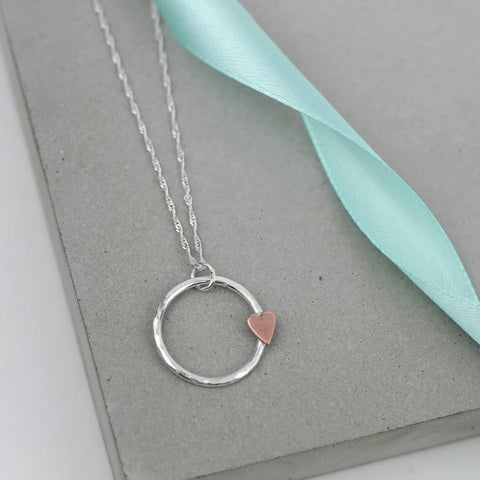 Copper heart on Metal circle necklace