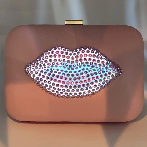 Lips like sugar clutch in the dark