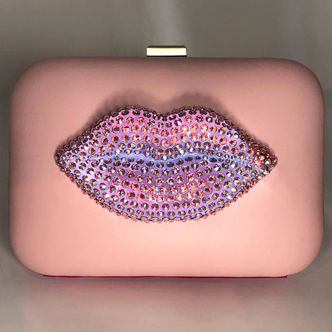 Lips like sugar clutch in dim light