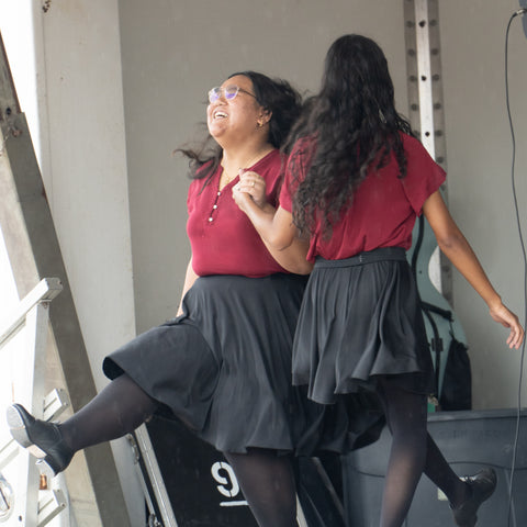 Two of the Saline Fiddlers perform Appalachian step dancing 