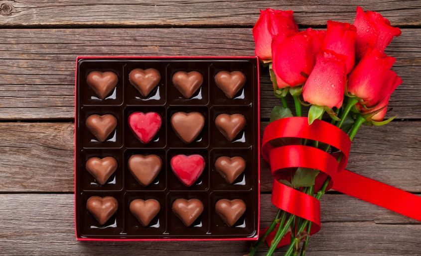 Box of chocolate and rose