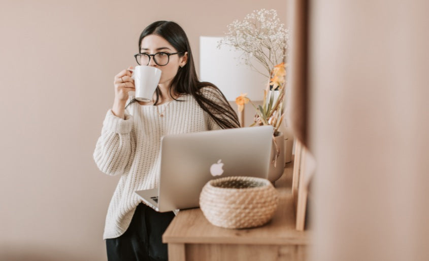 Woman enjoying coffee with Reishi mushroom