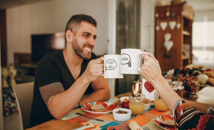 man and woman enjoying coffee