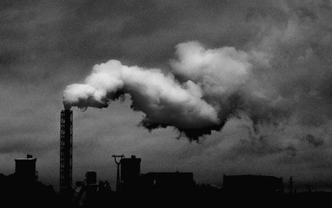 Industrial air pollution billowing out into the sky