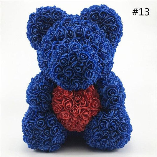 teddy bear with blue roses