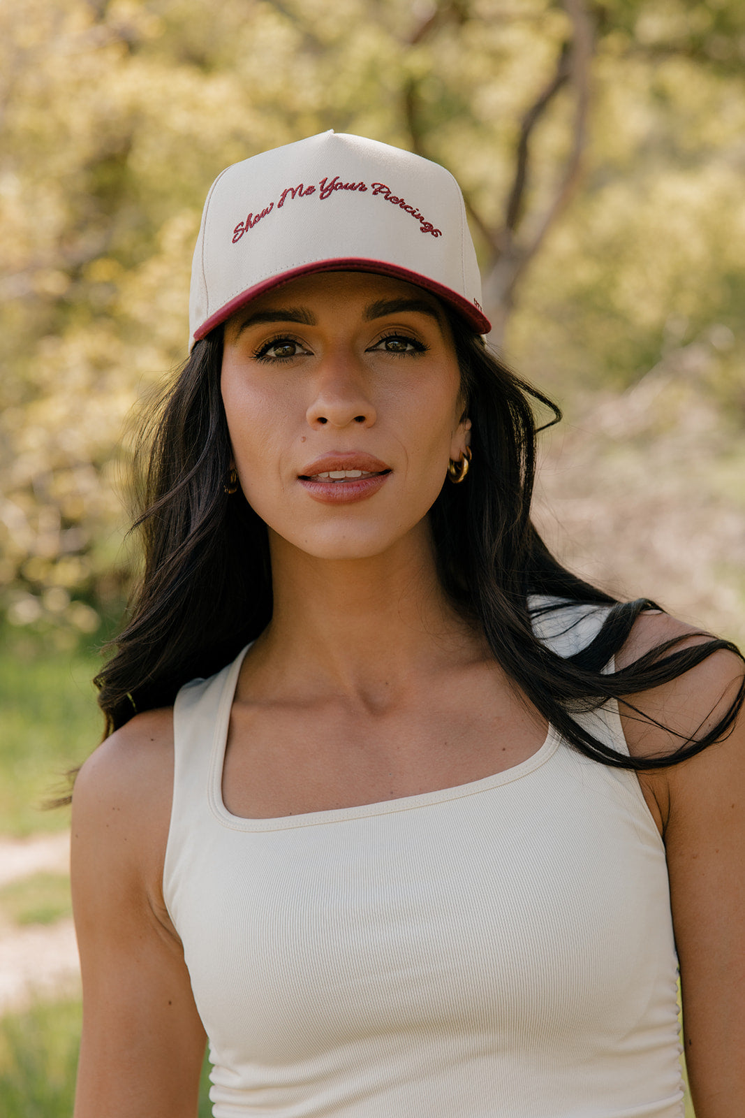 Show Me Your Piercings Trucker Hat in Berry