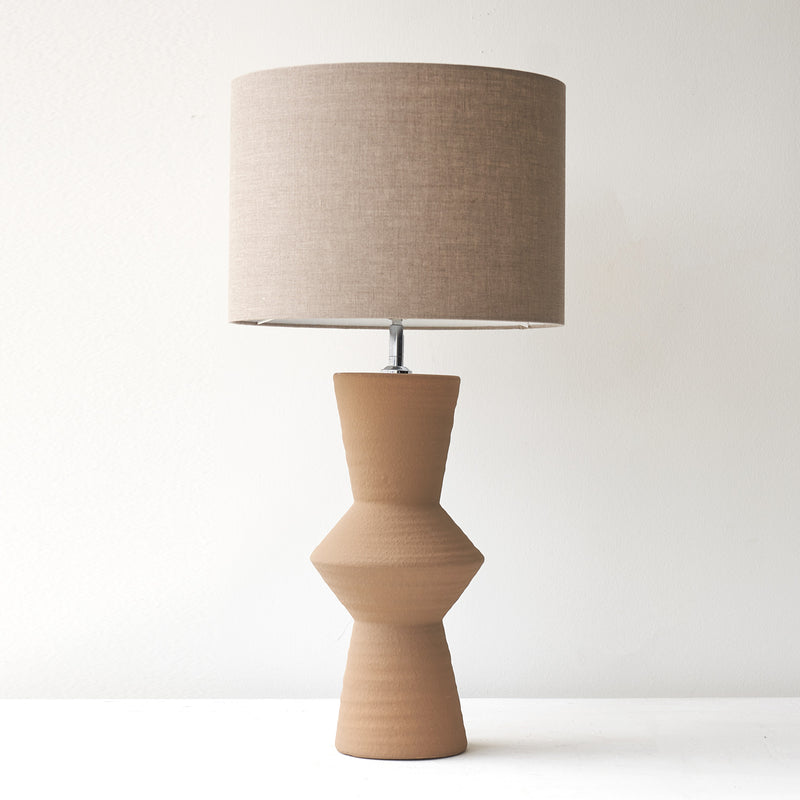 brown and gold lamp