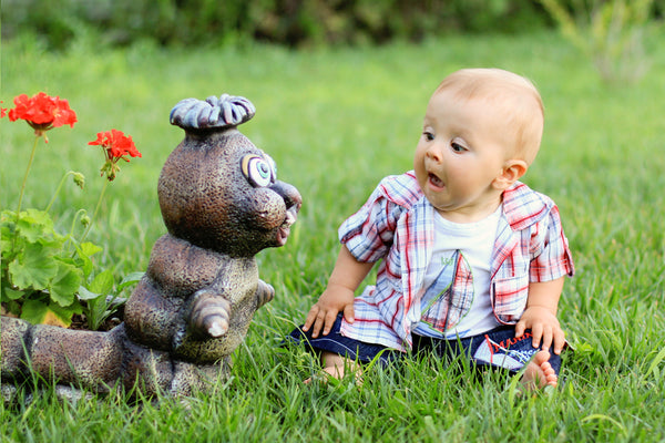 Little Boy with Garden Sculpture