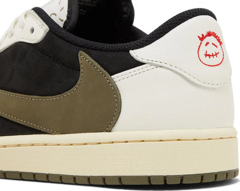 The Travis Scott x Women’s Air Jordan 1 Retro Low OG SP ‘Olive’ presents the chart-topping rapper’s first sneaker collaboration in female sizing. The upper combines a black suede base with off-white leather overlays and olive suede Swooshes, featuring a reverse check on the lateral side and a traditional design on the opposite side. The neutral earth tones are punctuated by bold crimson accents, highlighted by woven Nike Air tongue tags and mismatched Jordan and Cactus Jack branding on each heel tab. Anchoring the low-top is a rubber cupsole that pairs vintage off-white sidewalls with an olive green rubber outsole.