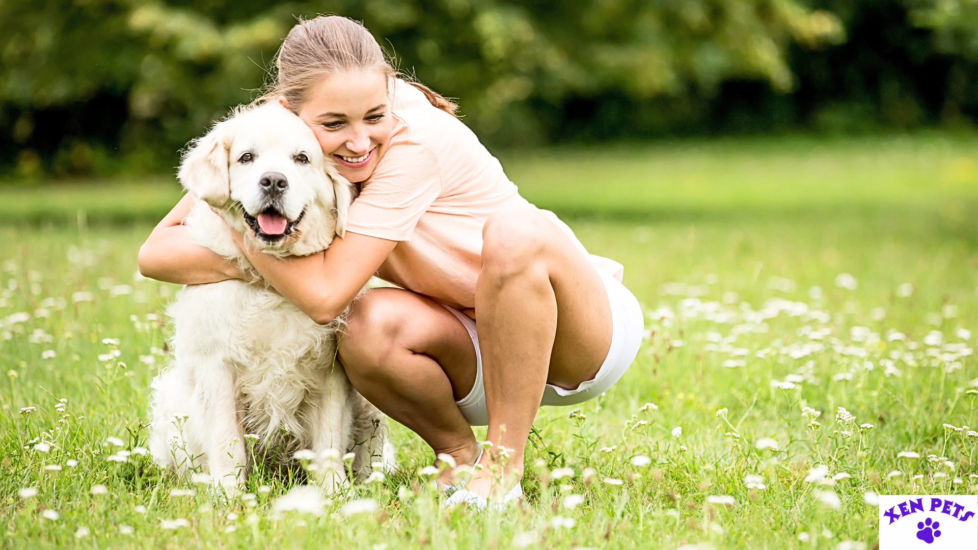 Young Woman Hugging Golden Retriever