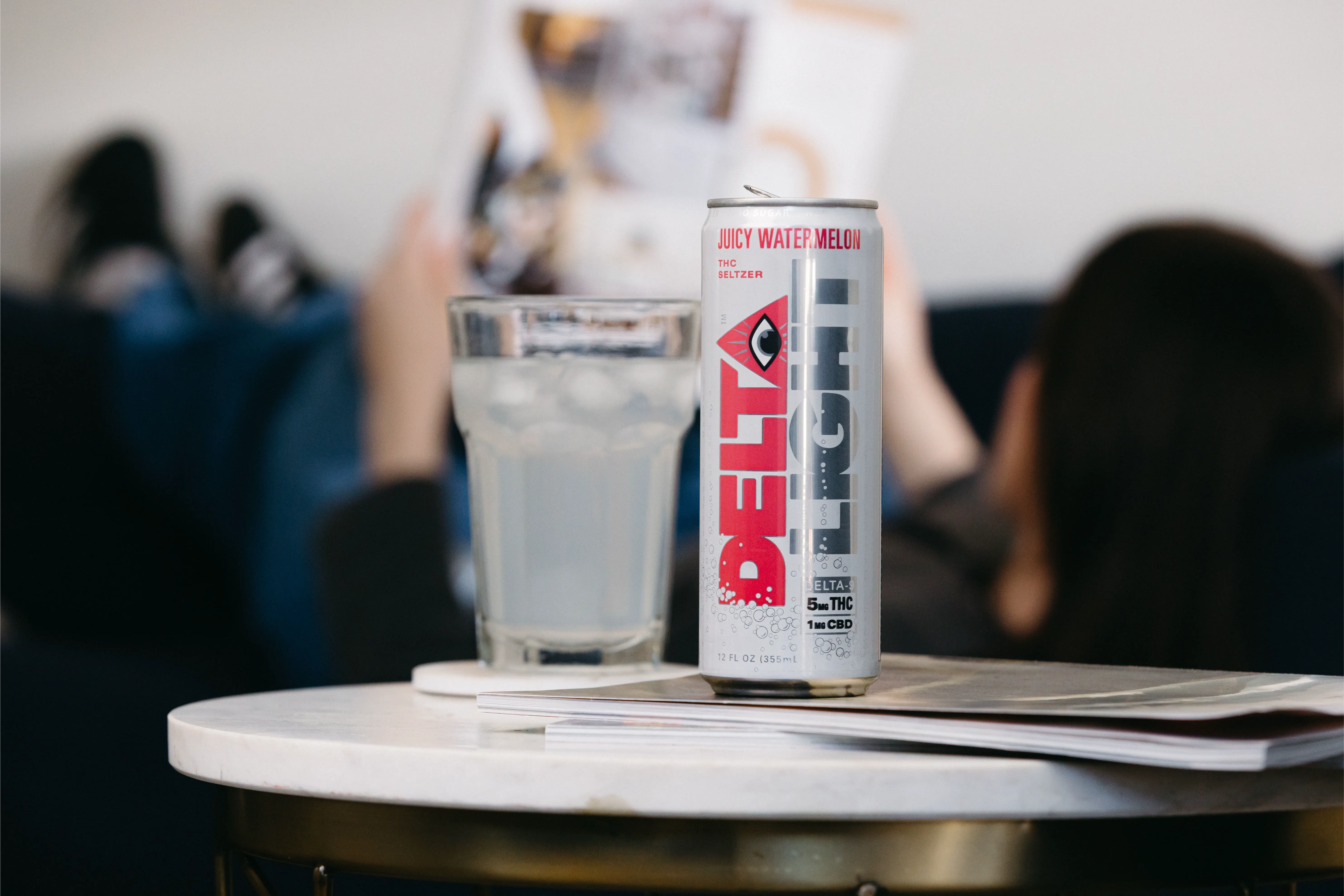 Delta Light THC seltzer poured into a glass