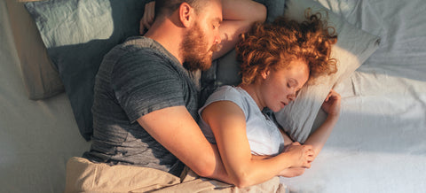 Couple Sleeping in Bed