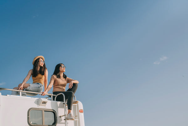 Two women on an RV