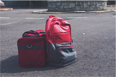 travel bags on the floor