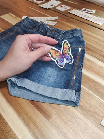 Placing the butterfly tattoo on the short