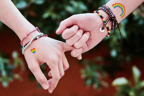 couple wearing tattoos