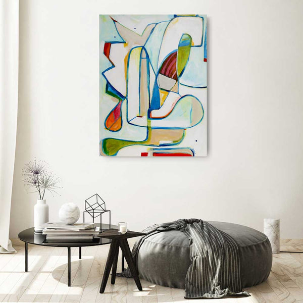 Colourful canvas wall art hanging in a comfy louge