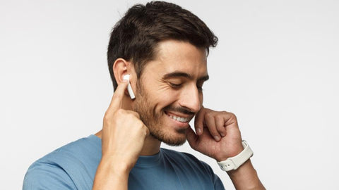 A person listening to his favourite tunes on earbuds