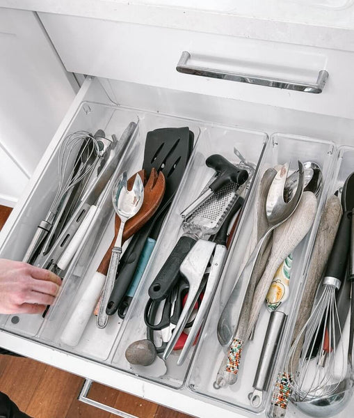 kitchen utensils organised in drawer using a drawer divider