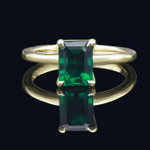 Emerald cut solitaire ring in yellow gold