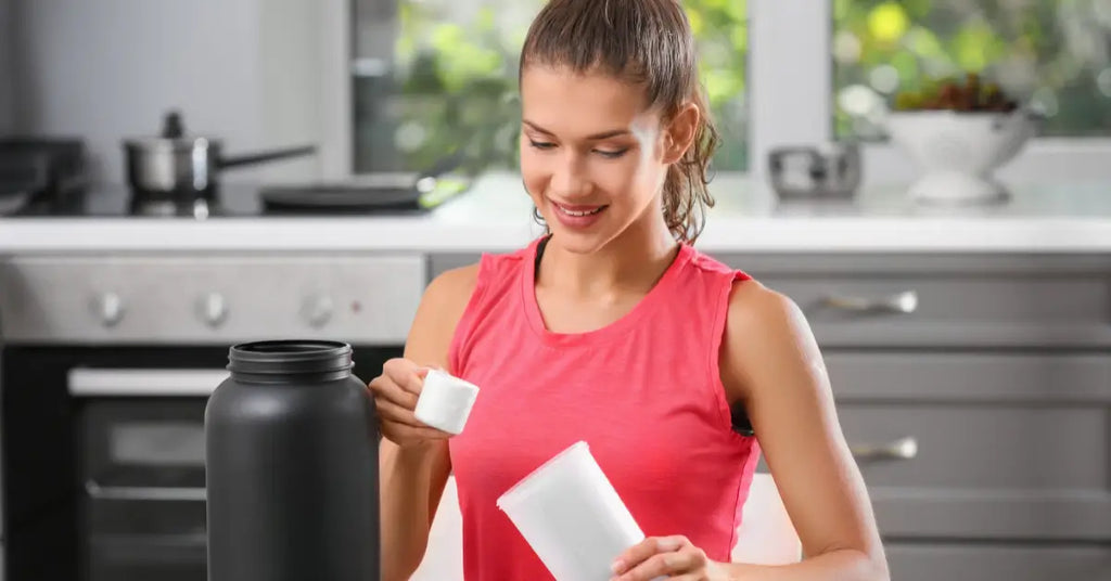 Woman preparing a protein shake, querying if protein powder is vegan