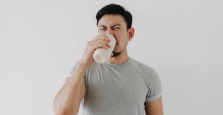 does protein powder expire man thinking as he drink