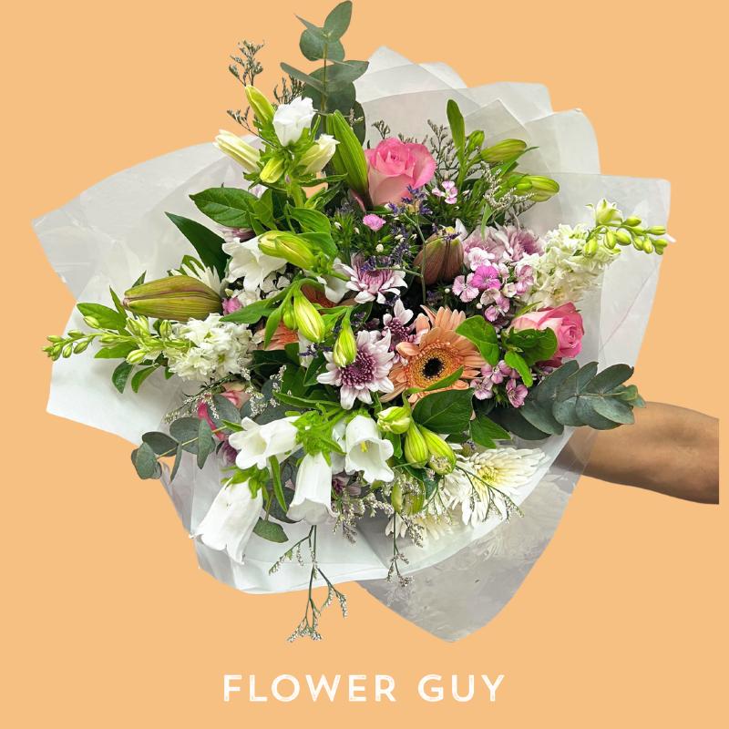 Free Spirit Bouquet is a seasonal bouquet of flowers with pink, white and green flowers