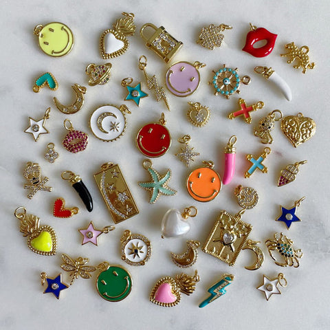 various colorful gold charms to hang on your charm necklace
