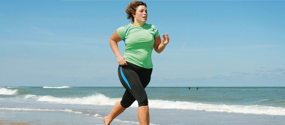 Woman running on the beach