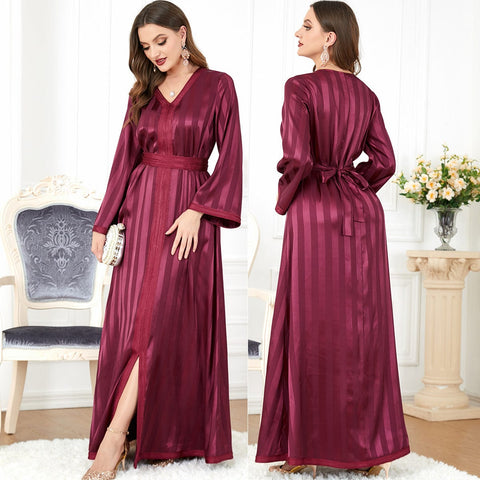 a woman wearing long sleeved european american dress double view front and back