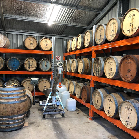 Racks of whisky barrels in the Backwoods bond store
