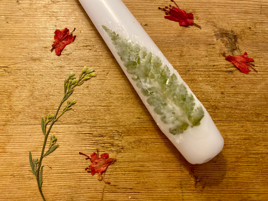 Candle decorating with pressed flower