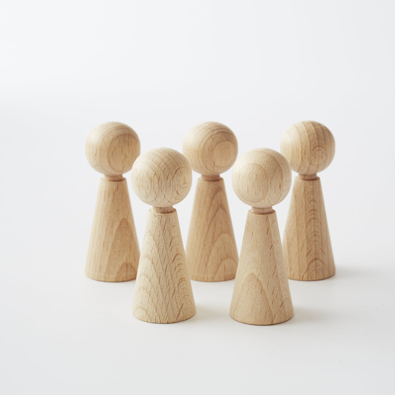 unpainted wooden peg dolls