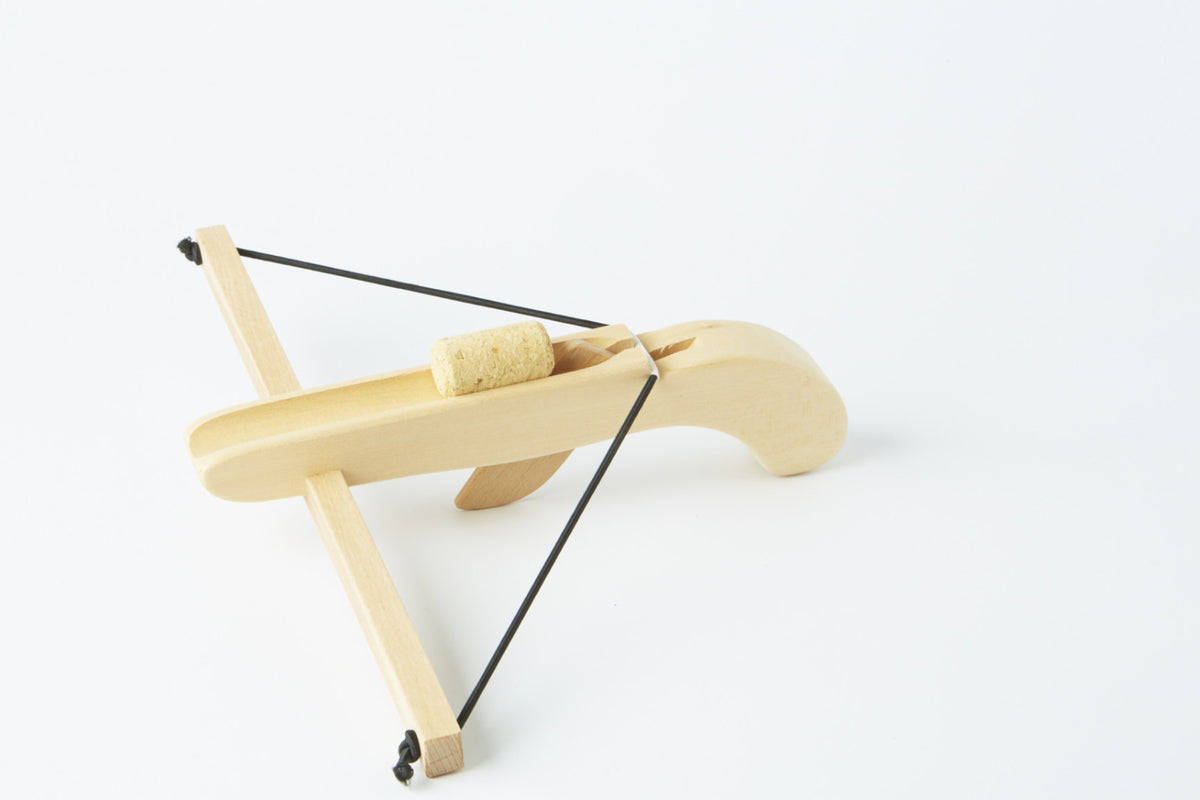 wooden-crossbow-with-cork-conscious-craft