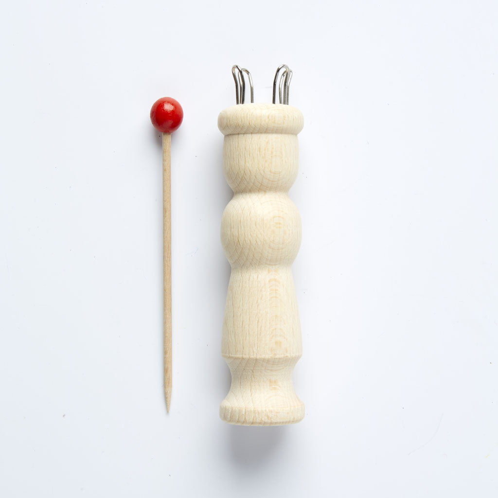 wooden knitting doll