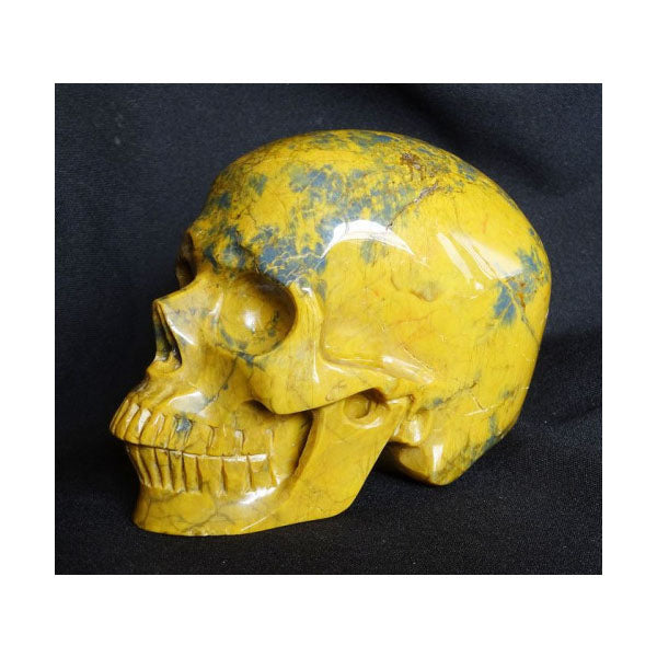 Se The skull carved into Pietersite crystal hos Altideals