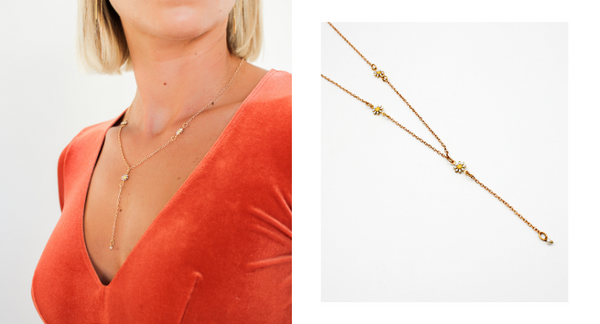 The long daisy necklace worn on a model