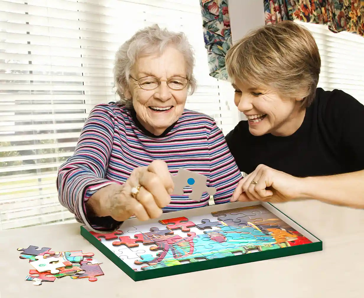 elderly woman doing car puzzle