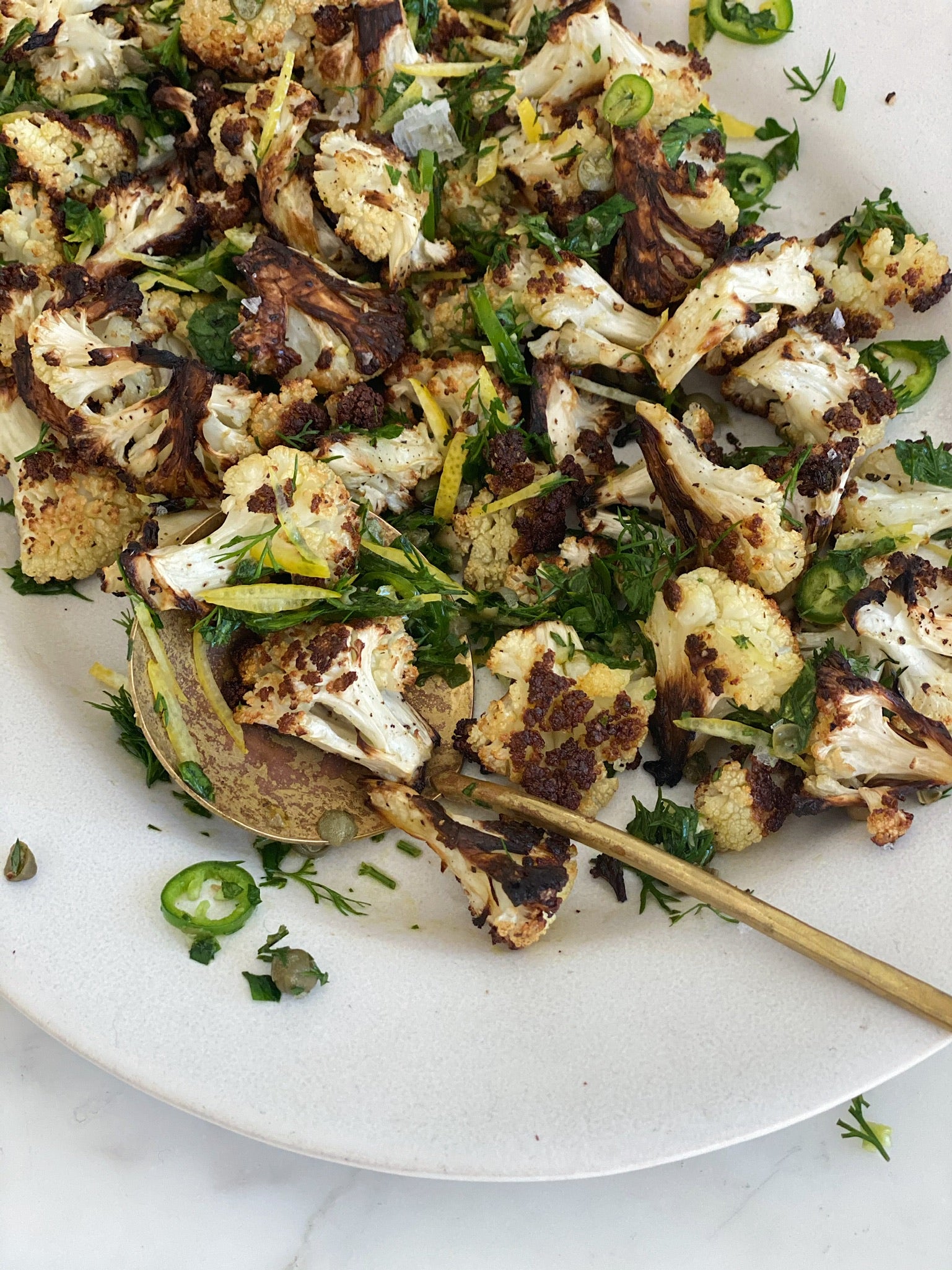 Roasted Cauliflower with Lemon Zest, Parsley, Capers, and Jalapeño