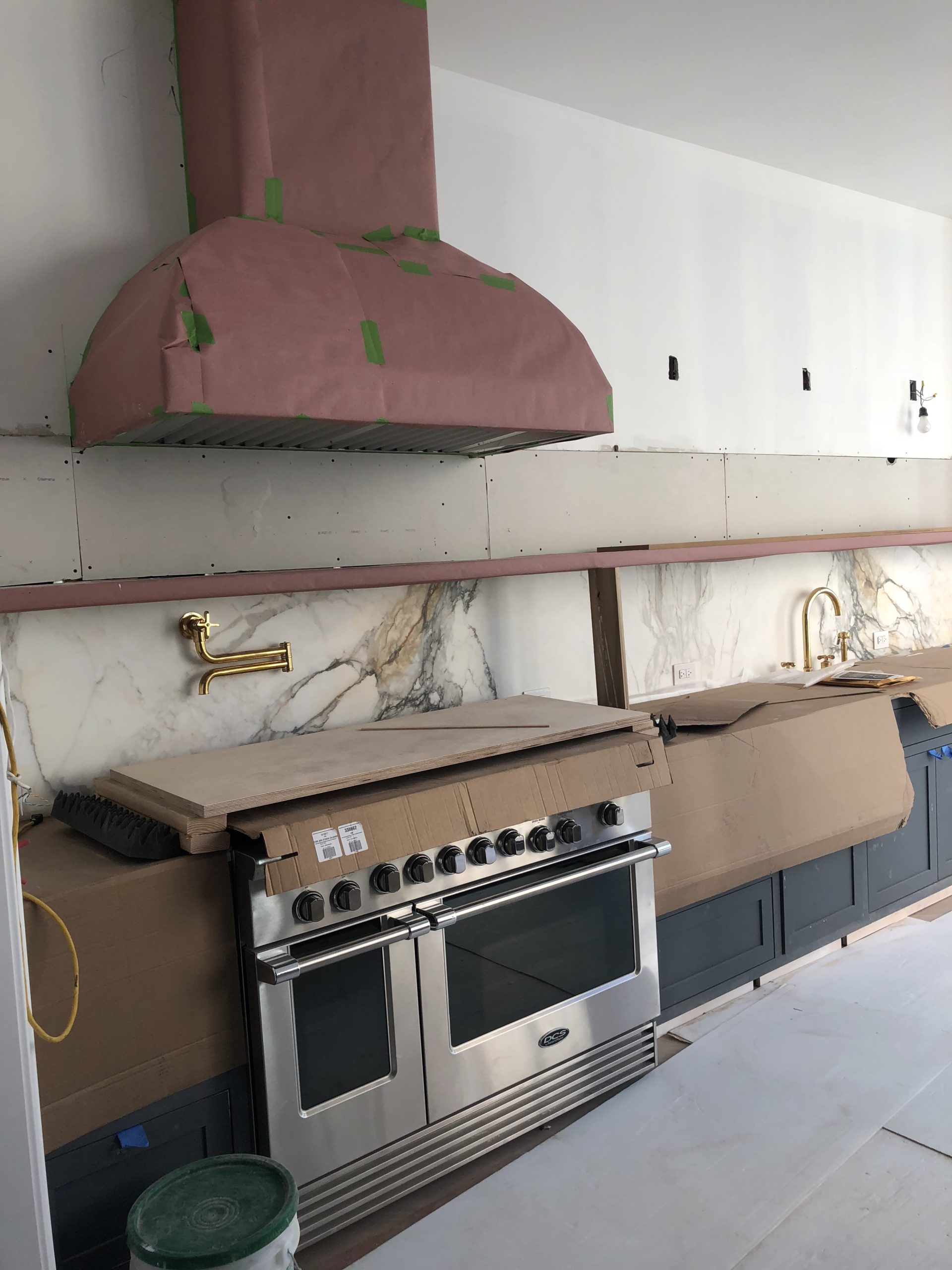 How Athena Calderone Created Her 20' Marble Floating Kitchen Shelf