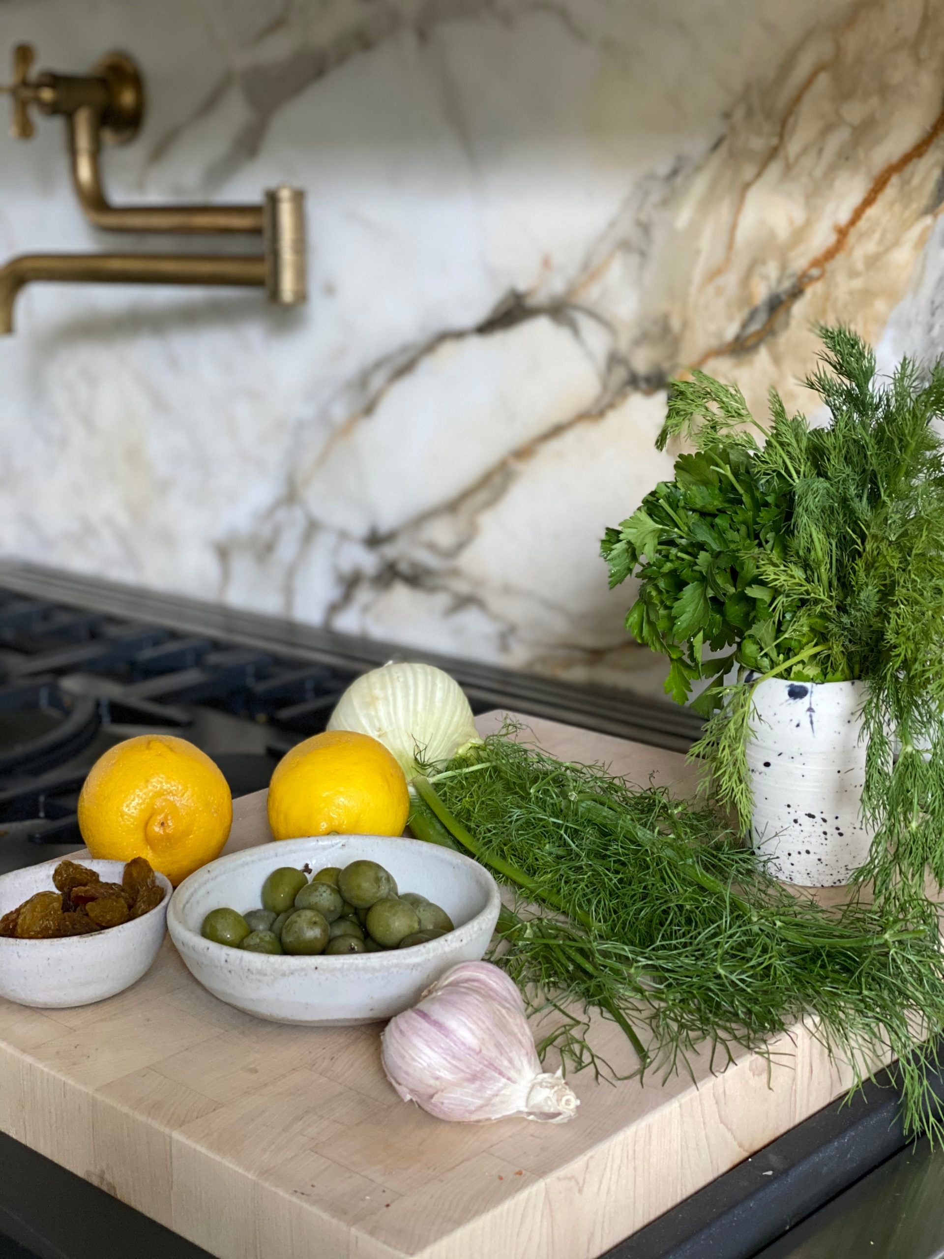 Swordfish With Raisins and Roasted Lemon–Olive Chutney