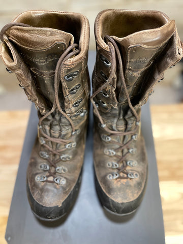 A heavily worn pair of Kenetrek Mountain Extreme Boots.