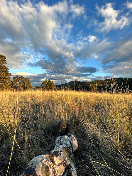 A photo of hunting pants in a field