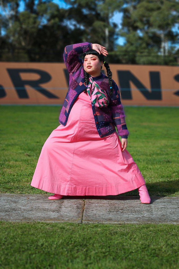 Nadia wears: Country Road pink dress, Vintage cardigan, Baggu bumbag, Gorman pink ankle boots. Photo by Hayley Hughes