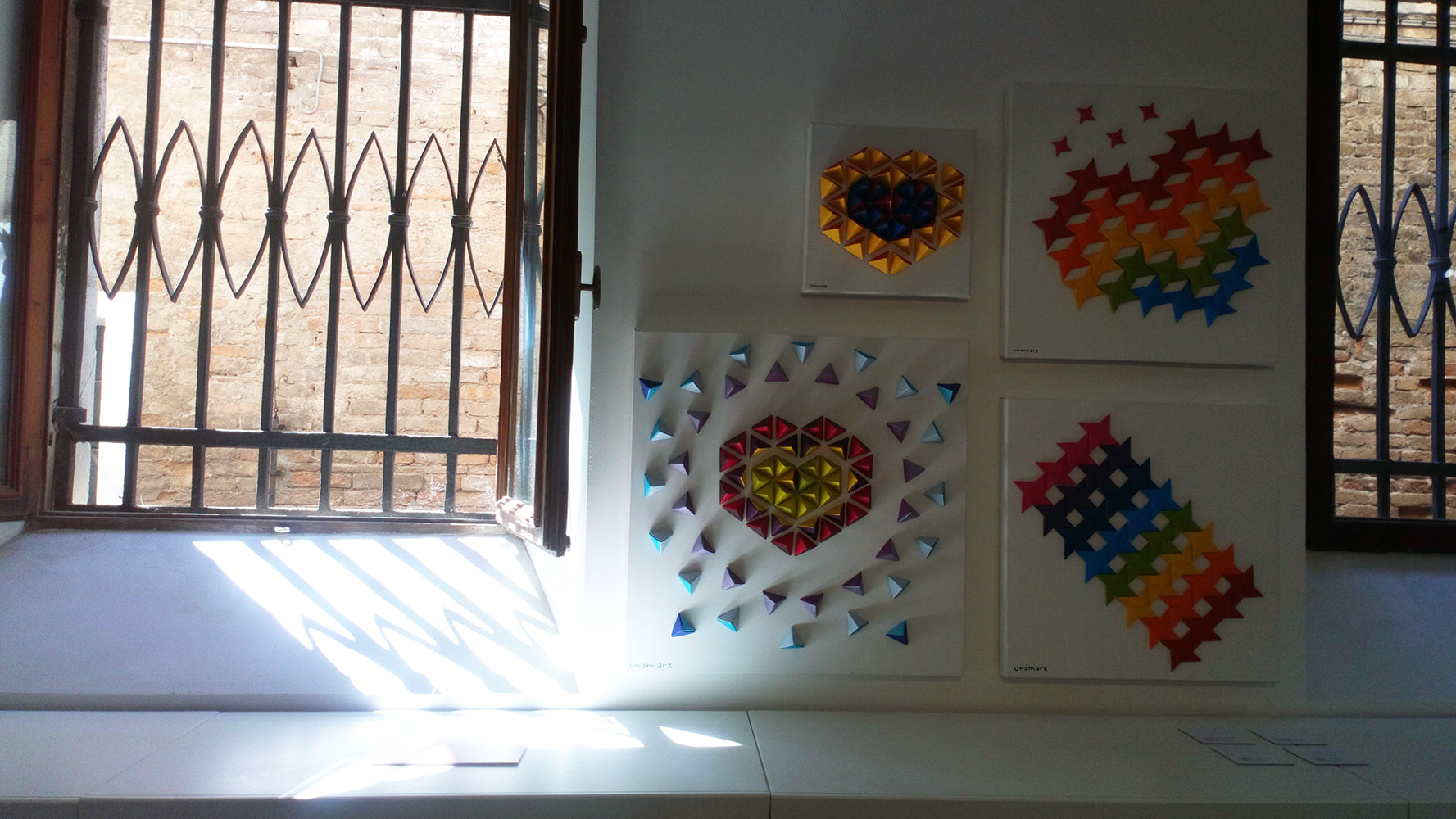 Four original origami artworks by unamarz in exhibition in Venice, Palazzo Albrizzi Capello, in 2021