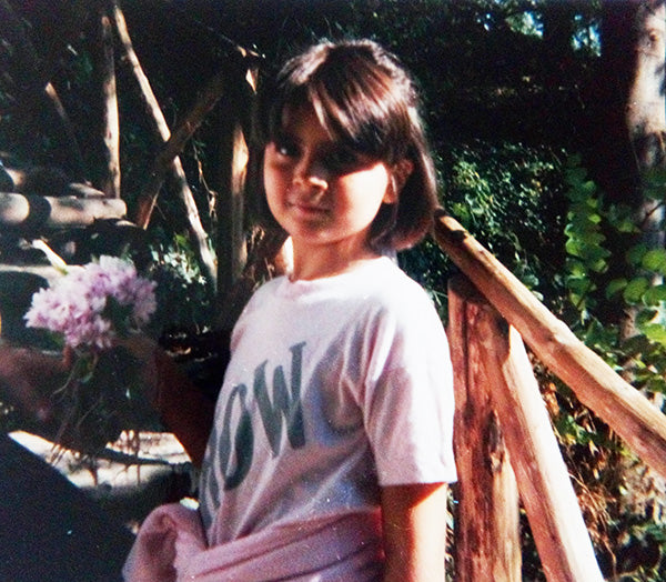Photo of Una (unamarz) wearing pink clothes in her childhood