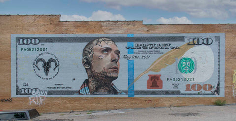 The rap artist, Caskey, commissioned a large street painting to use in one of his videos.