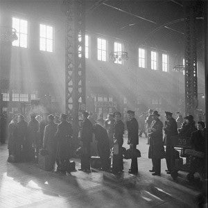Soldiers, sailors, and civilians wait in line at Chicago's Union Station to catch a train. Sometime during WW2. Library of Congress