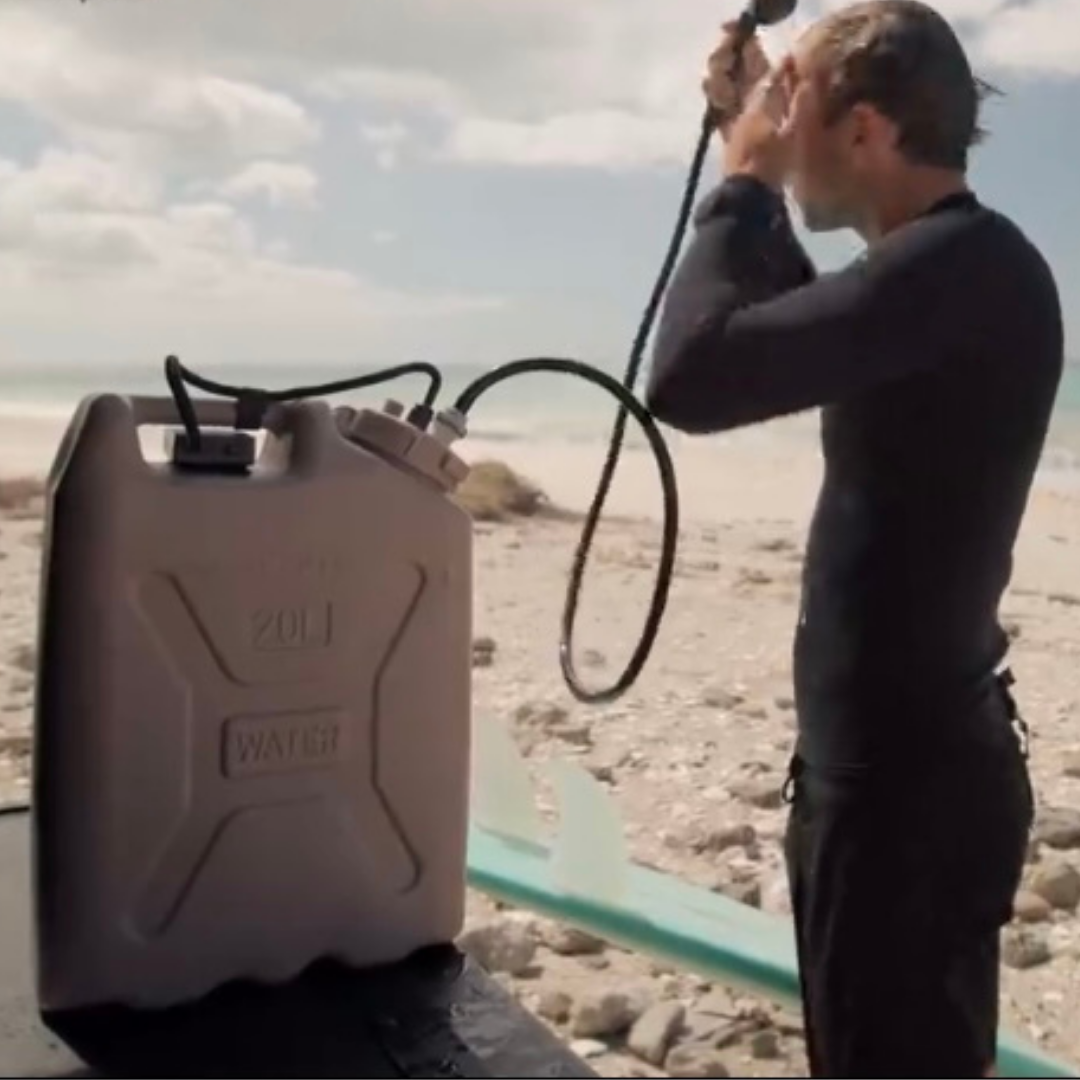 Trailwash portable shower washing off surfer